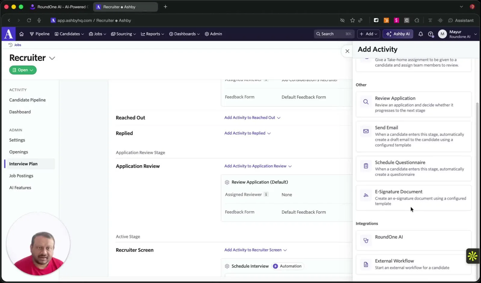 The Interview Plan for a Recruiter job in Ashby with the Add Activity panel open, listing Review Application, Send Email, Schedule Questionnaire and E-Signature Document, and RoundOne AI under Integrations