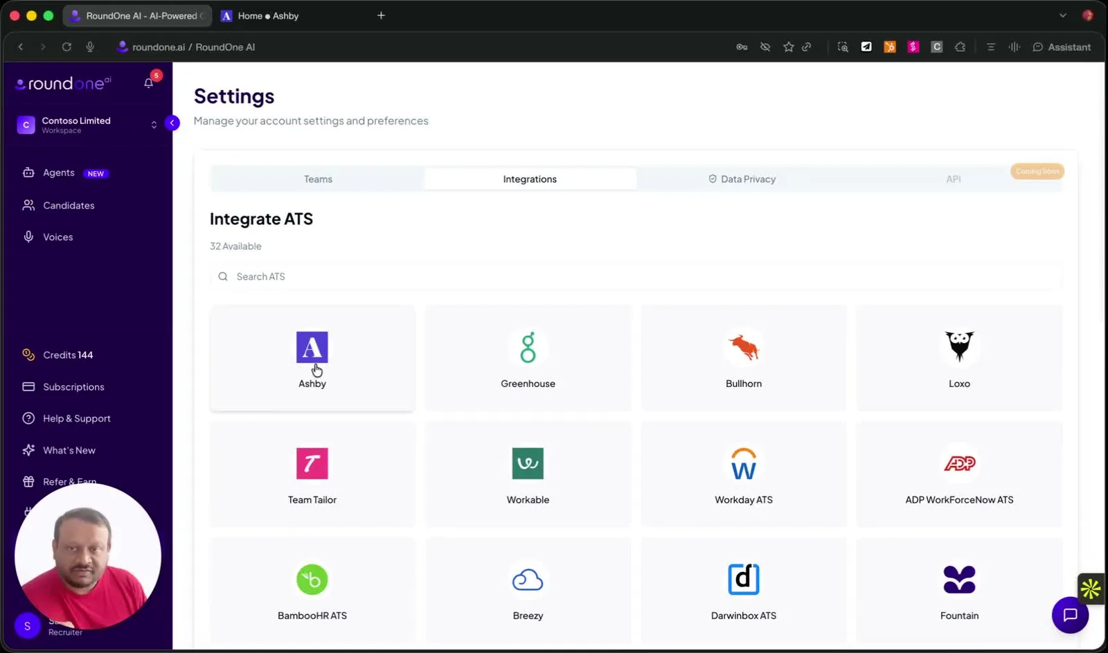 RoundOne Settings on the Integrations tab, showing the Integrate ATS grid with the Ashby tile first, followed by Greenhouse, Bullhorn, Loxo, Team Tailor, Workable and other ATS tiles